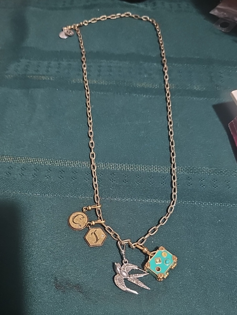 Gold-Tone Charm Necklace with Turquoise Enamel and Swallow Pendant